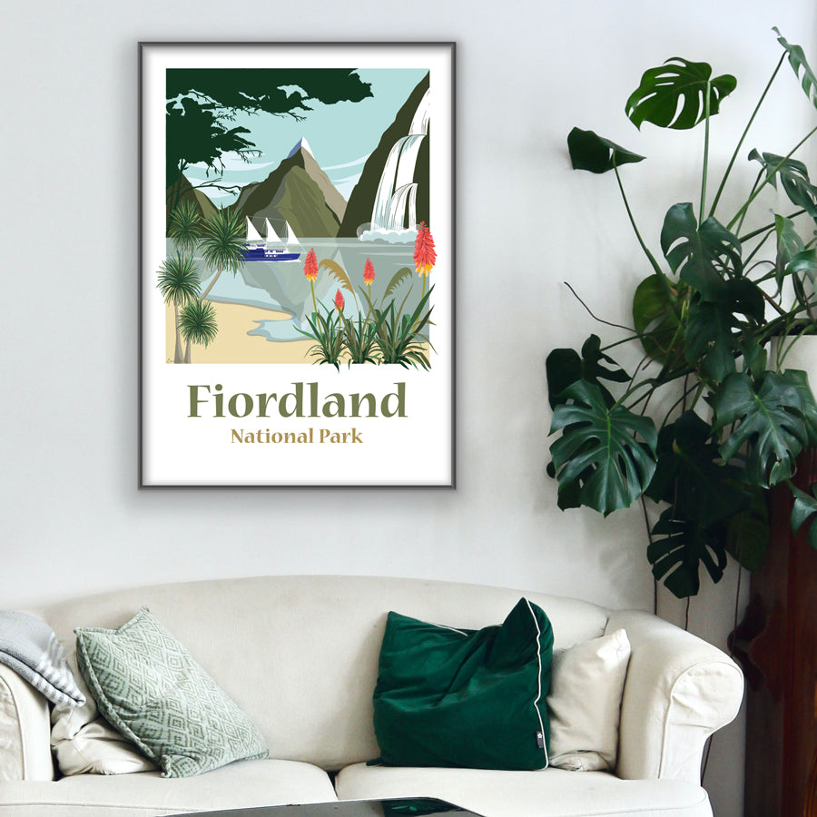 Framed Travel Poster Travel Poster of Fiordland on the South Island of New Zealand.  Illustration of Milford and Doubtful Sound.  Mitre Peak, The Milford Mariner in Fiordland New Zealand.  Illustrated by Studio Peers