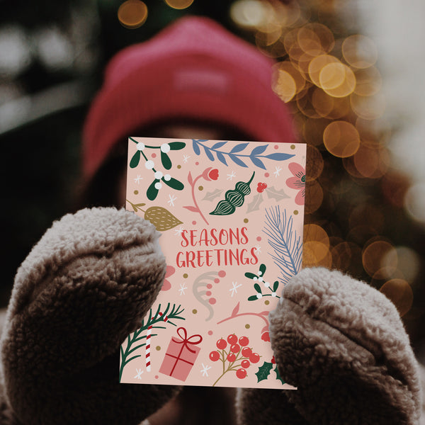 Seasons Greetings Christmas Card pack.  Floral design with Holly, gifts and mistletoe 